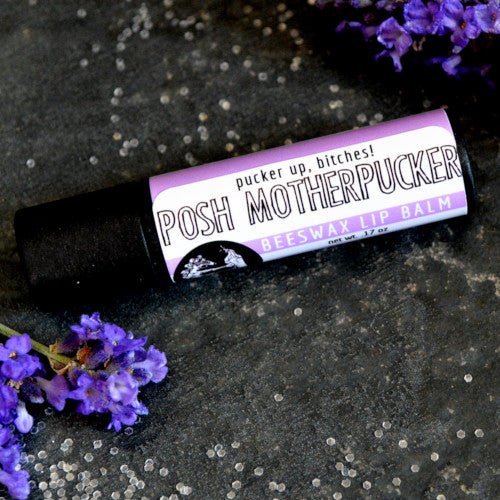 This Posh Motherpucker Lip Balm. will elevate your skincare routine by incorporating a natural Lip balm. It's made by Badgerface Beauty Supply