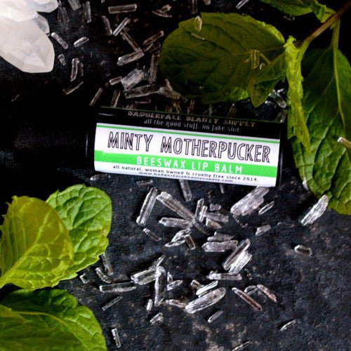 This Minty Motherpucker Lip Balm. will elevate your skincare routine by incorporating a natural Lip balm. It's made by Badgerface Beauty Supply
