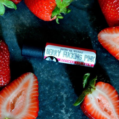 This Berry Fucking Pink Lip Balm. will elevate your skincare routine by incorporating a natural Lip balm. It's made by Badgerface Beauty Supply