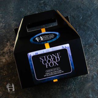 Men’s natural skincare gift set with beard balm, scrub, and moisturizer in eco-friendly packaging