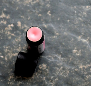 This pale pink grapefruit lip balm with nourish your pout with purely natural ingredients.
