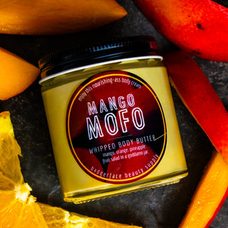 This whipped body butter with shea and mango butter is scented with natural mango, orange, and pineapple extracts.