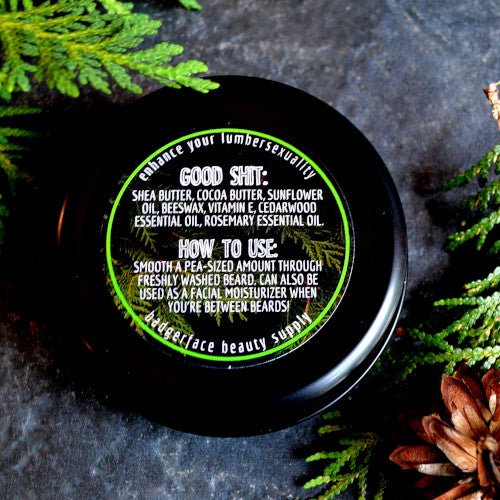 This cedar rosemary beard balm is made with natural ingredients like beeswax, cedarwood essential oil, and vitamin E.