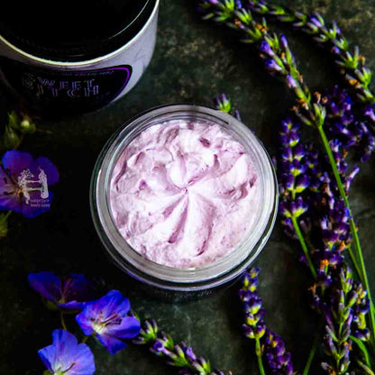 Experience the creamy texture of our lavender body scrub, made with real shea butter.