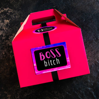 The label on Badgerface Beauty Supply's gift box for boss reads "Boss Bitch," and it's full of natural bath products.