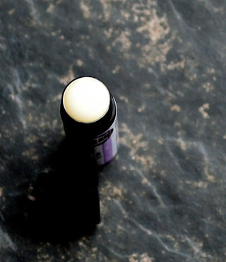 Experience the creamy shea butter texture of this lavender lip balm.