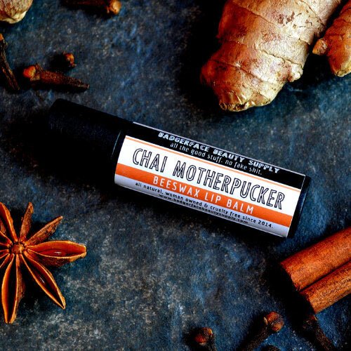 This Chai Motherpucker Lip Balm. will elevate your skincare routine by incorporating a natural Lip balm. It's made by Badgerface Beauty Supply