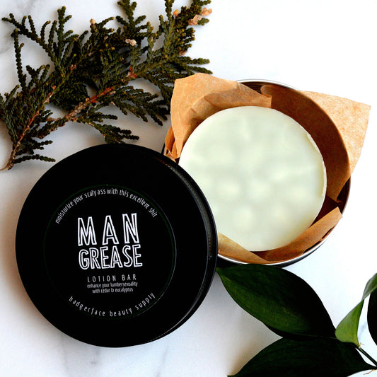 Our Man Grease lotion bar can be packaged in a sleek black tin for taking on-the-go.