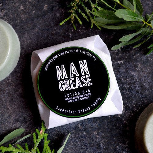 This Man Grease Lotion Bar. will elevate your skincare routine by incorporating a natural Lotion bar. It's made by Badgerface Beauty Supply
