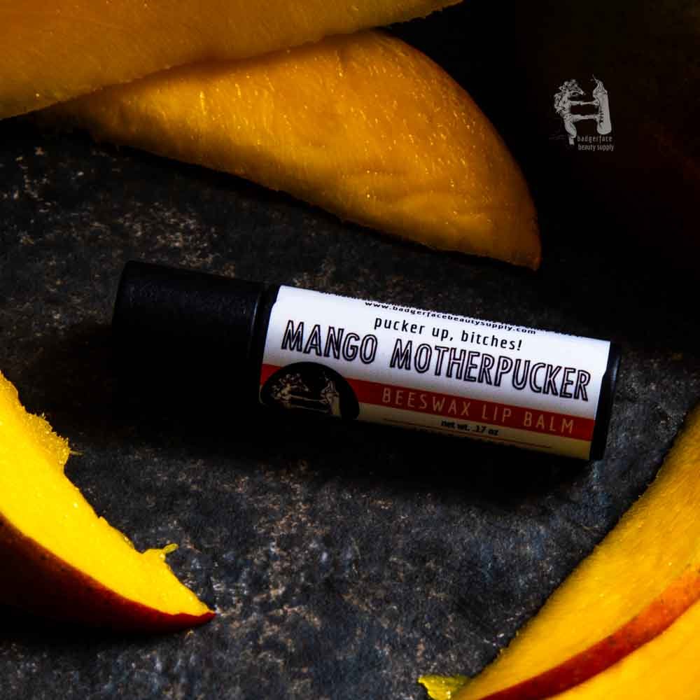 Experience the tropical goodness of this mango lip balm, made by Badgerface Beauty Supply eco friendly bath products shop.