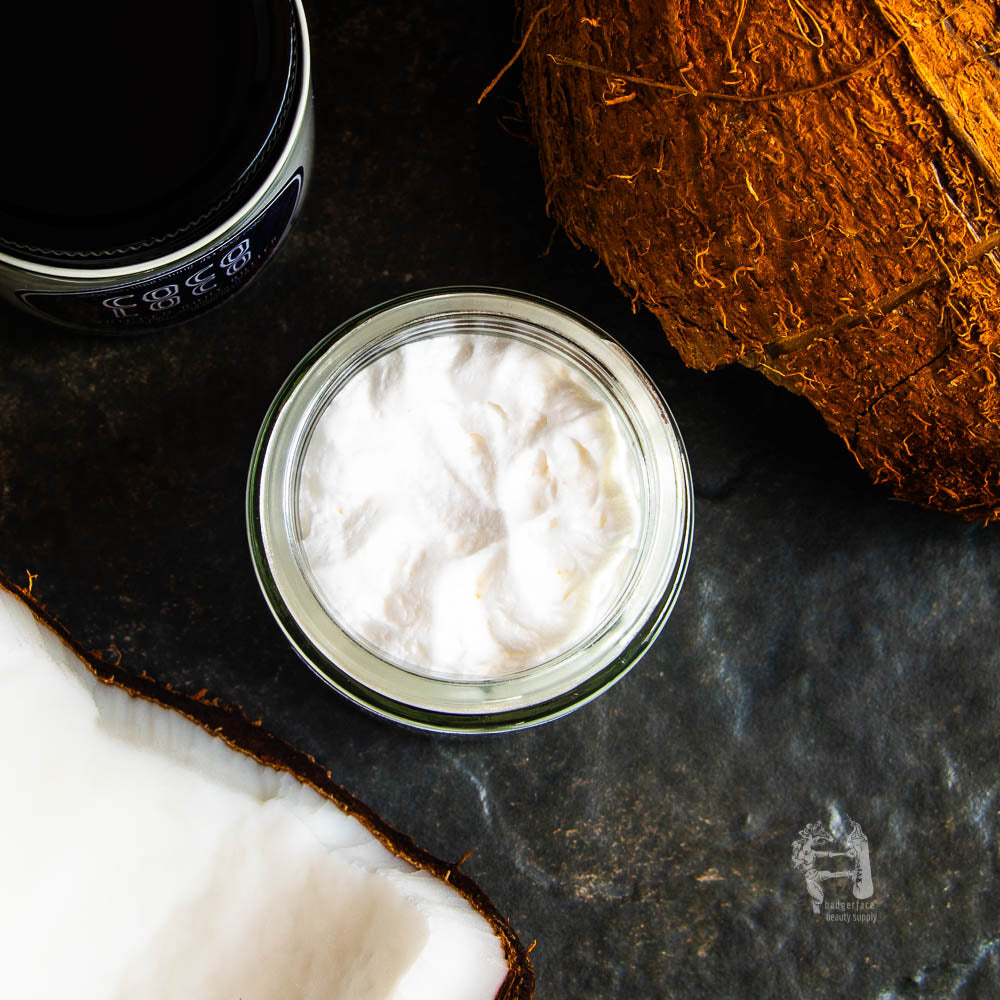 Experience the creamy texture of this whipped coconut body butter by Badgerface Beauty Supply.